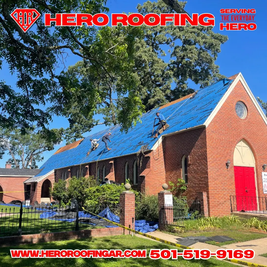 Church roof replacement in progress in Conway, AR — Hero Roofing crew at work