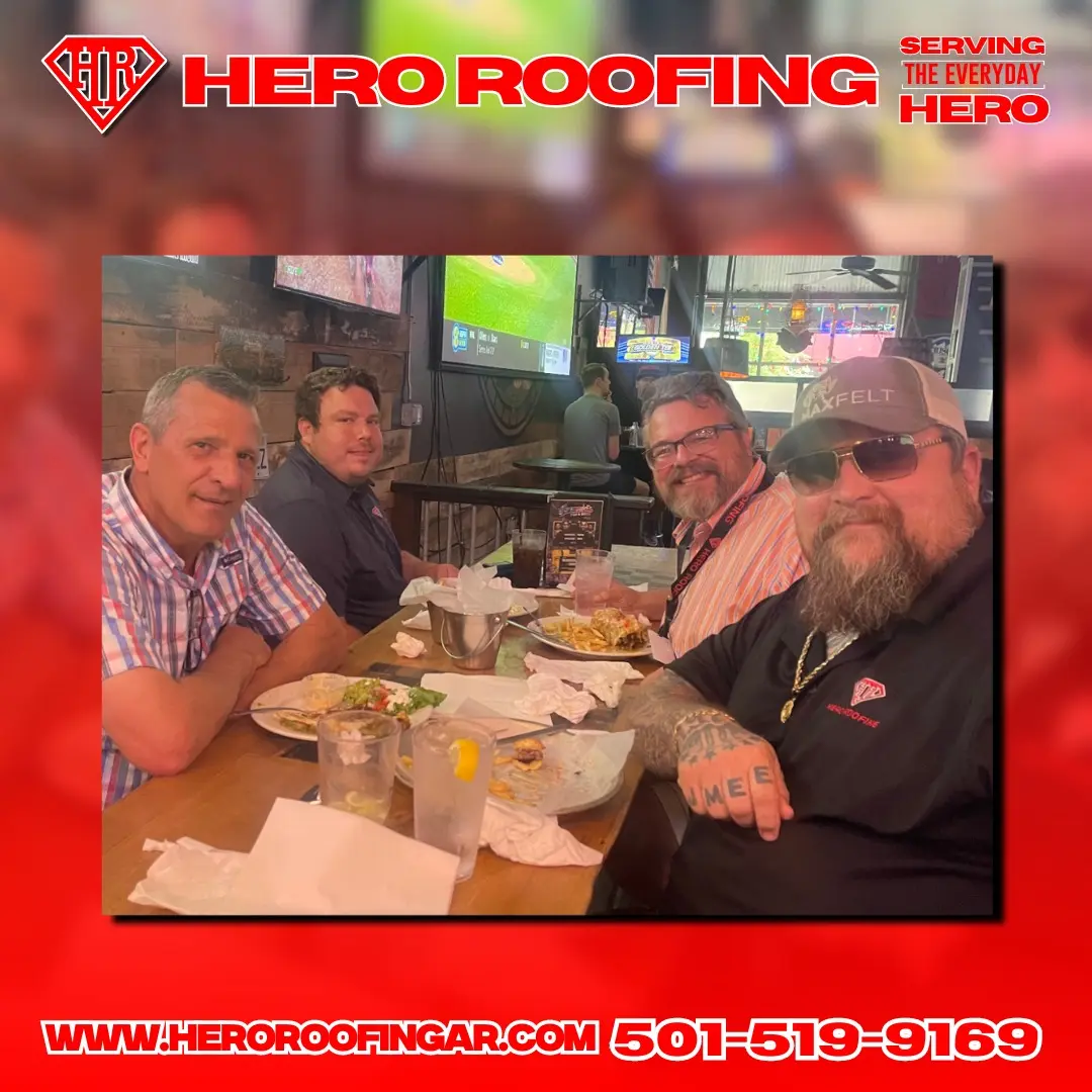 Hero Roofing team sharing a meal with local business owners in Central Arkansas