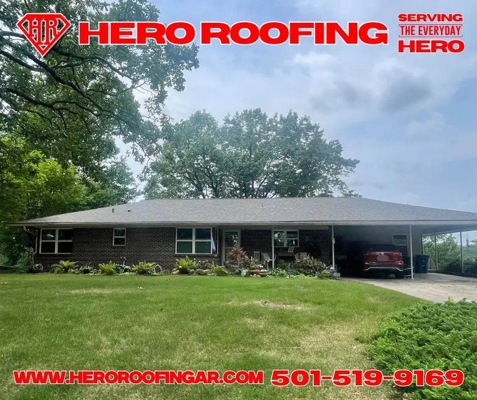 Completed asphalt shingle roof on a long brick ranch home with a carport in Central Arkansas by Hero Roofing